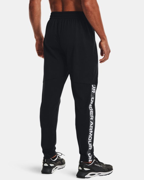 Men's UA Tricot Track Pants, Black, pdpMainDesktop image number 1